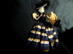 9 1/2'' FOLKART WHIMSY GREY HAIRED OLD ART DOLL,  METAL STAND